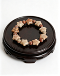 Star-shaped coral jade bracelet